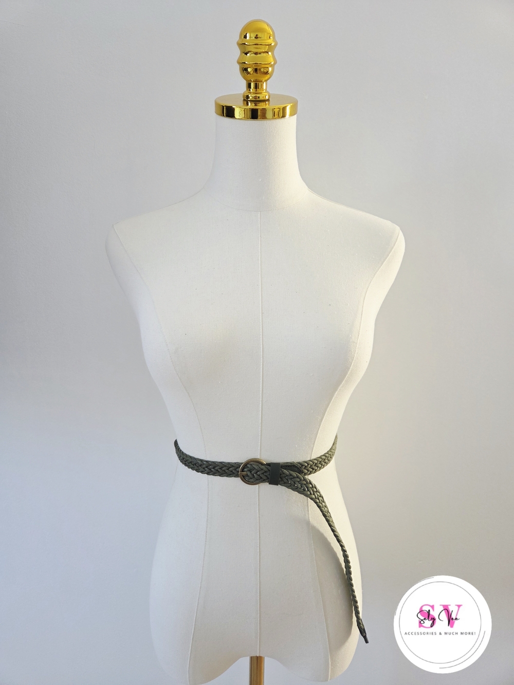 Green braided belt with gold buckle